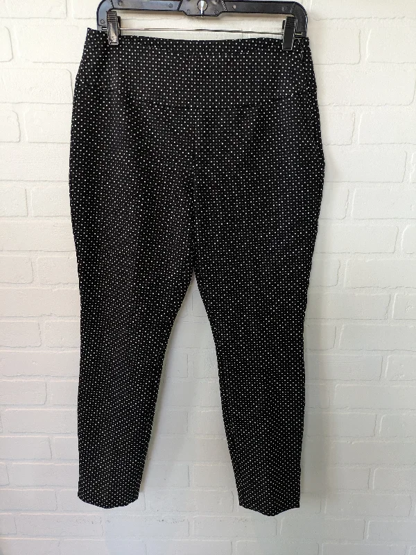 Retro bell-bottom pants for 70s-inspired fashion -Black & White Pants Dress Cabi, Size 8