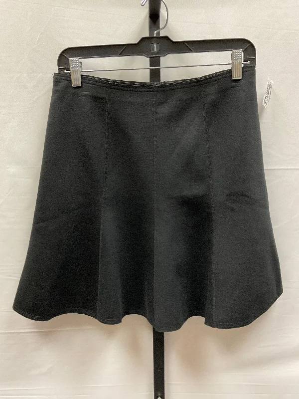 Ruffled skirts for soft romantic appeal -Black Skirt Mini & Short Ann Taylor, Size 4